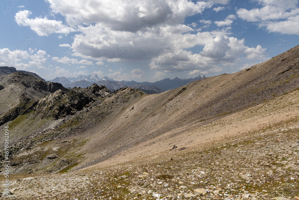 Fototapeta premium Panoramic alpine view from Col des Marches overlooking the Maurienne Valley near Valmeinier in the French Alps.