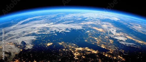 View of earth from space at night showing lights and land
