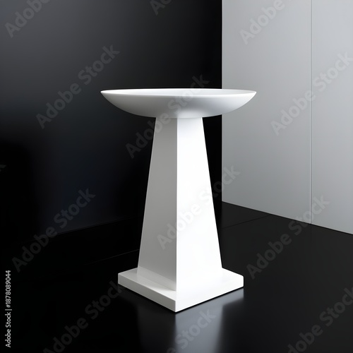 Sleek white pedestal set against a deep black background, creating bold contrast that highlights clean lines, minimalist elegance, and modern product display aesthetics