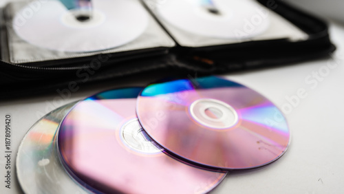 Картината върху платно Bunch of CD and DVD discs organized in a disc holder.