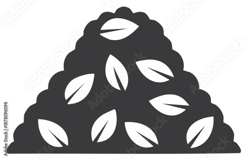 Pile of mulch with scattered leaves, depicting yard work and composting concept