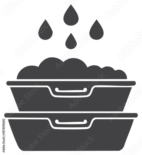 Laundry basins with suds and falling water drops in monochromatic grayscale