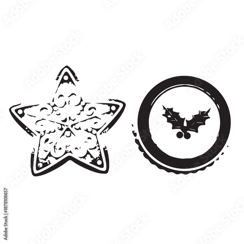 Two decorative cookies shaped as a star and a round circle with a bat silhouette.