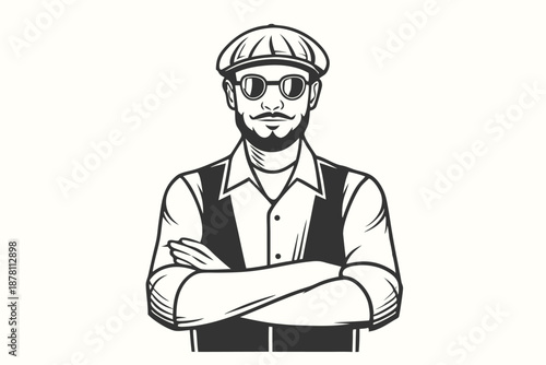 Confident mustached man wearing a cap and glasses stands with crossed arms smiling slightly