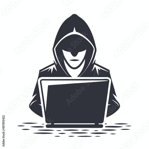 Hooded silhouette using laptop shows digital threat and cybersecurity issues happening today