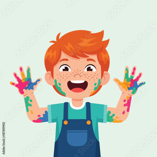 Happy child with paint on hands.