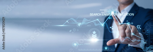 Marketing expert pointing at data network and SEO on digital interface. Search Engine Optimization, digital visibility, organic traffic growth, and keyword ranking analytics.