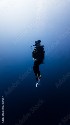 Wallpaper Mural Scuba diver exploring deep blue ocean in Maldives Torontodigital.ca
