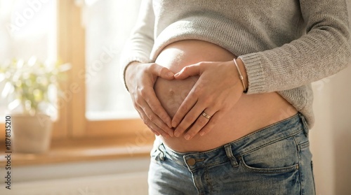 Expectant mother lovingly cradles her growing baby bump, symbolizing new life and maternal affection
