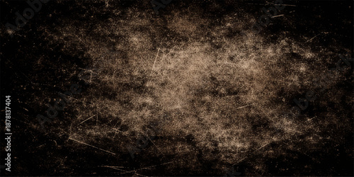 A dark and grunge black and white abstract background featuring a rough textured stone wall with a vintage aged paper pattern on a dirty blank surface backdrop