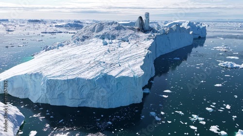 GREENLAND - 11.4.2025 - Remarkable aerial footage approaching a large iceberg on Greenland's Disko Bay.