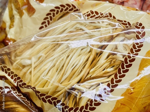 Artisan Smoked Cheese, Golden Braided Chechil Ready For Sale, Vacuumsealed Smoked Cheese With Rustic Appeal, Prepared Chechil Cheese With Smoky Aroma And Artisanal Packaging