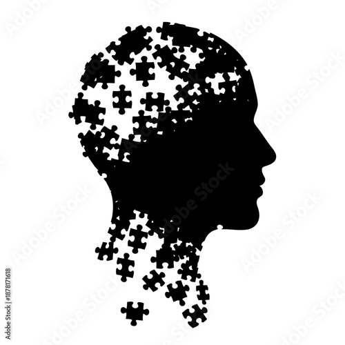 Human Head Silhouette with Puzzle Pieces Disintegrating.