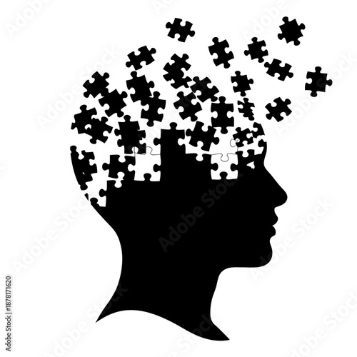 Silhouette of a human head with puzzle pieces falling from the brain.