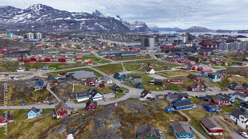 GREENLAND - 11.4.2025 - Amazing aerial panorama of Greenland's capital Nuuk, with snowy mountains in the background.