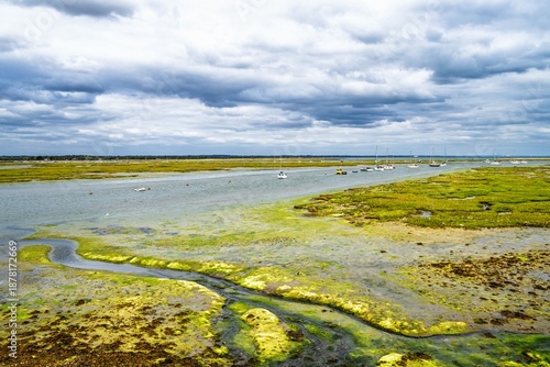 Valokuva Marshes and boats over Hurst Spit, Milford on Sea, Lymington, Hampshire, England