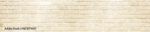 Light beige brick wall texture background with clean stone surface and panoramic horizontal layout