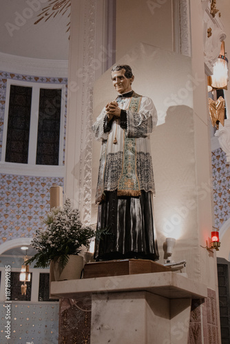 Statue of a Priest in a Church