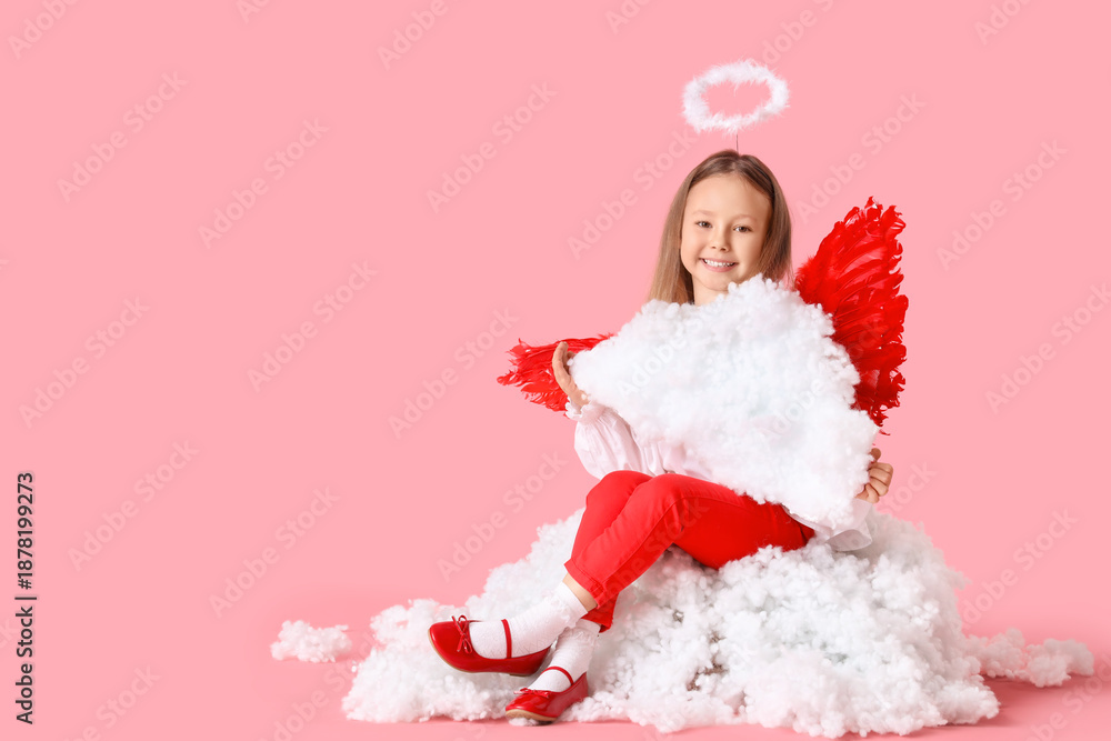 Fototapeta premium Cute little girl dressed as cupid sitting on cloud against pink background. Valentine's Day celebration