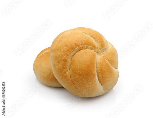 Photos Freshly baked kaiser roll or Vienna roll, round wheat bun, isolated on white bac