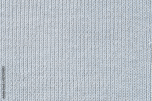 Soft light gray jersey knit fabric pattern close up as background