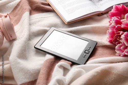 Modern e-reader with book a...