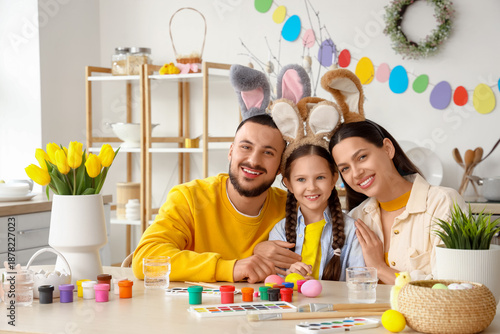 Happy parents with their li...