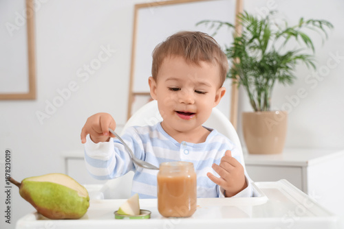 Cute little baby with jar o...