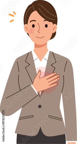 Woman In A Brown Suit With Her Hand On Heart Smiling