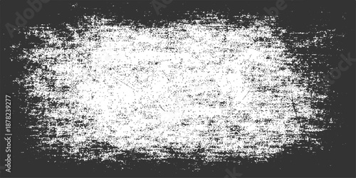 An abstract black and white grunge background features a textured dirty wall pattern with a vintage paint splash and liquid gray surface design