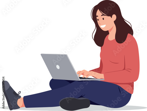 Young Woman In Coral Sweater Works On Laptop Sitting Cross Legged