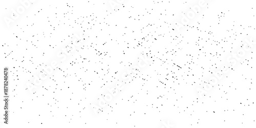 A black and white grunge background features a textured pattern of ink paint splashes and wet rain drops on an old dirty window surface