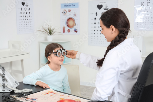 Female ophthalmologist putt...