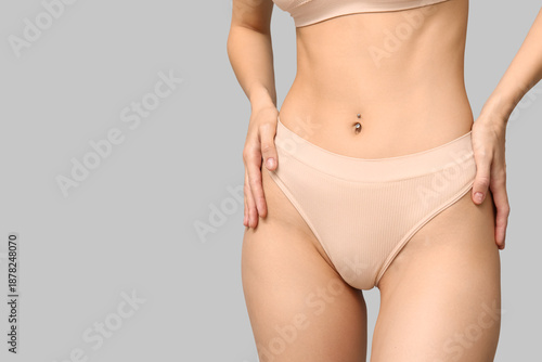 Young woman in underwear on...