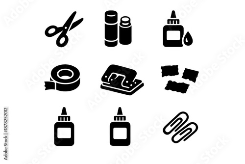 Essential crafting and supplies including scissors, glue, tape, and paper clips