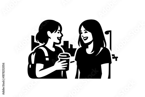 Young women friends talking and laughing while drinking coffee outdoors