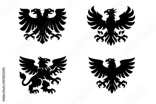 Set of four black heraldic symbols including eagles, double-headed eagle, and griffin