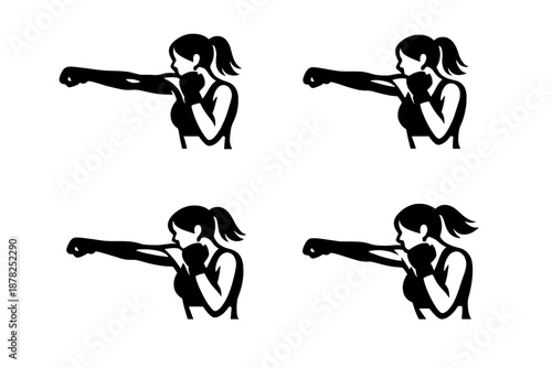 Female boxer silhouette throwing a powerful punch during a fitness workout