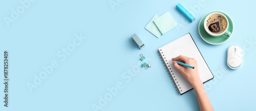 Hand writing in notebook on...