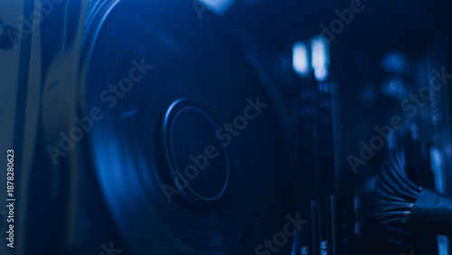 Quadro em tela CPU fan in motion with blue LED lighting, liquid cooling concept and thermal per