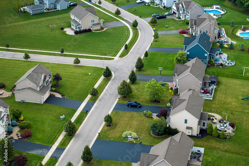 Wallpaper Mural Residential homes in suburban sprawl development in Rochester, New York. Low-density two story private houses in rural suburbs. Housing market in the USA Torontodigital.ca