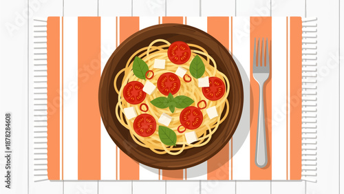 A rustic wooden bowl filled with spaghetti, cherry tomatoes, cheese cubes, and basil leaves rests on an orange striped placemat beside a silver fork, creating a cozy and appetizing overhead scene