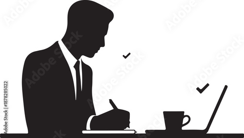 Silhouette of man working at desk with laptop and coffee cup