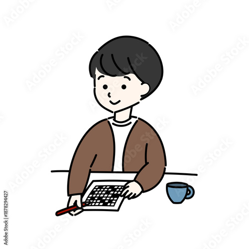 クロスワードをする男性