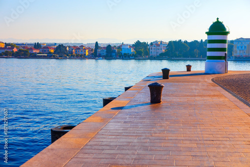Quadro su tela Zadar waterfront in Croatia, with lighthouse beacon and expansive view of Adriatic Sea