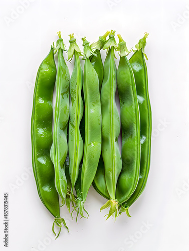 Fresh green pea pods from above on white background vegetarian ingredient
