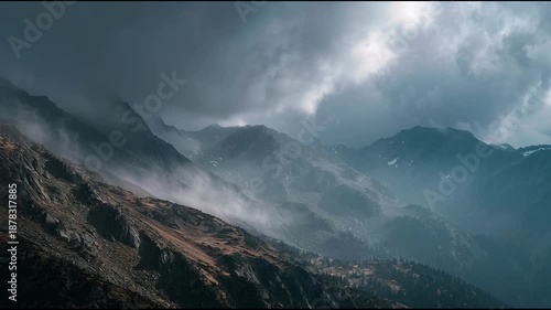 Misty Mountainside Landscape with Cloudy Sky.