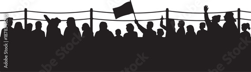 Silhouette of a crowd behind a fence with raised hands and flags