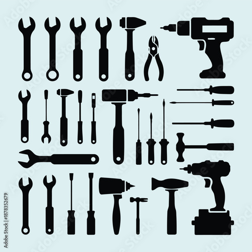 Collection of various tools and equipment for construction and repair work on a light blue background