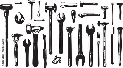 Isolated set of industrial steel tools including a hammer, wrench, and pliers on a white background for construction and repair work